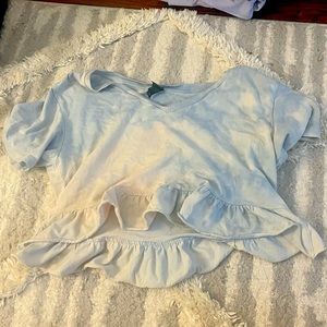 A light blue tie dye crop loose shirt